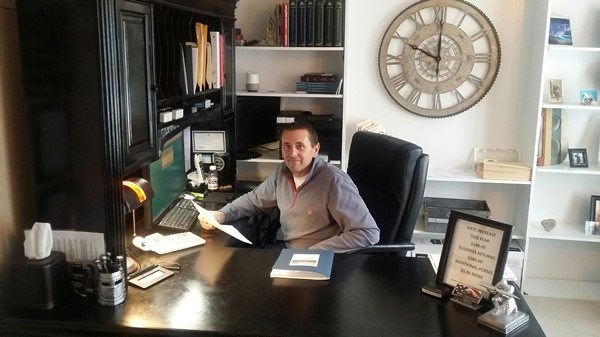 Michael R. Bement Jr. at his desk at Bement Tax Services in Channahon, Illinois